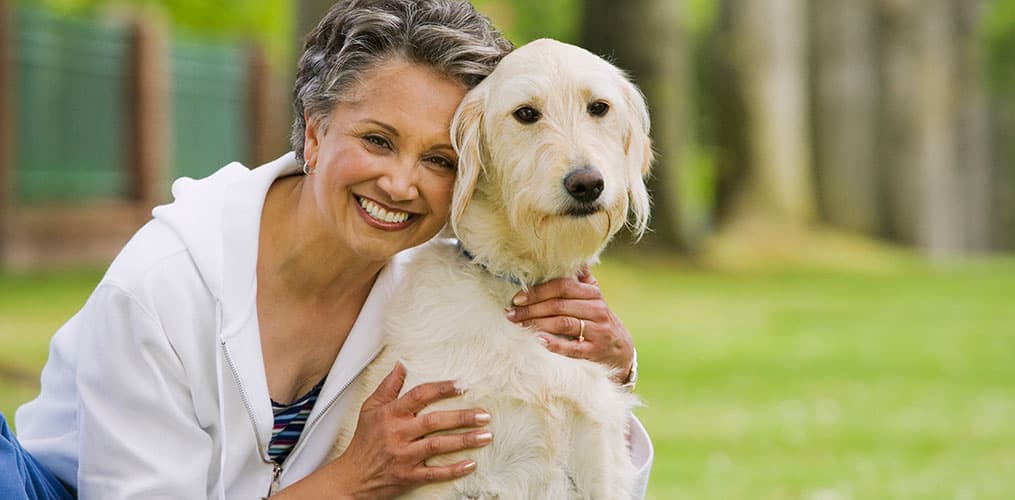 Seniors enjoying time with a companion pet