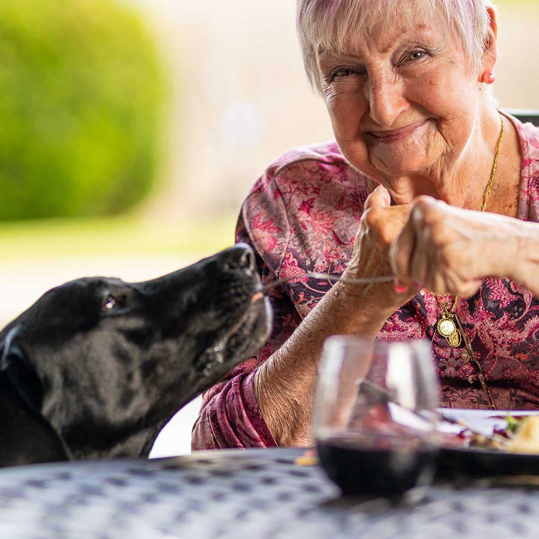 A senior and a dog